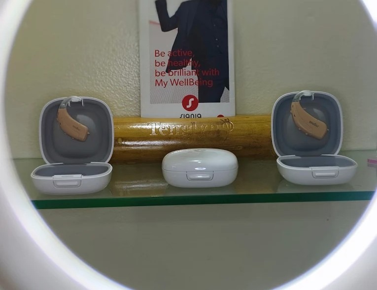 Signia hearing aids in charging cases at Neuma Clinic
